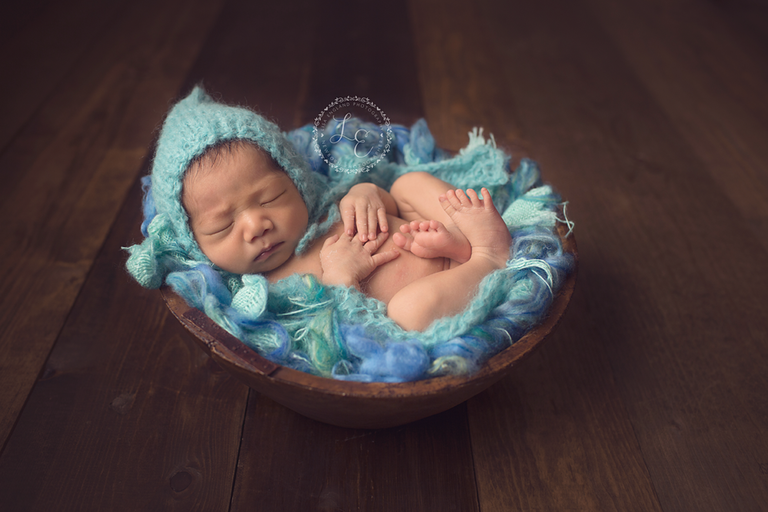 infant girl in turquoise
