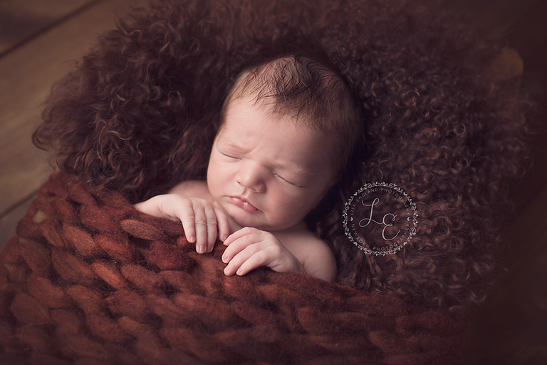 sleepy baby boy in fall colors