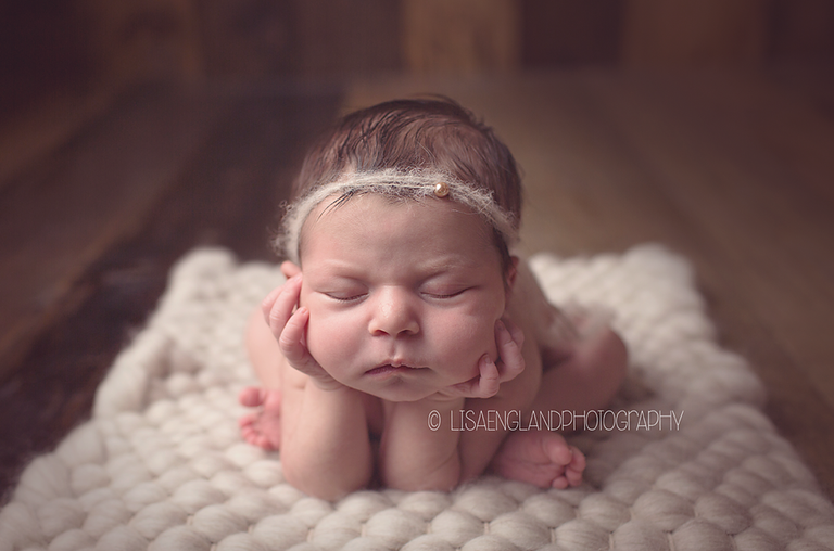 cute newborn with chin in hands -San Diego, CA newborn photographer and baby photographer- Lisa England Photography