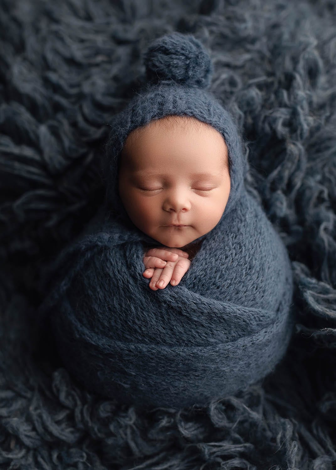 potato wrapped baby boy in all blue