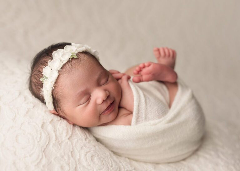 Beautifully wrapped and sound asleep during her newborn session in San Diego