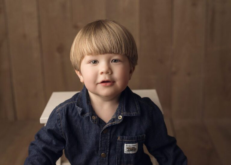 Toddler brother solo portrait during his baby sisters newborn session